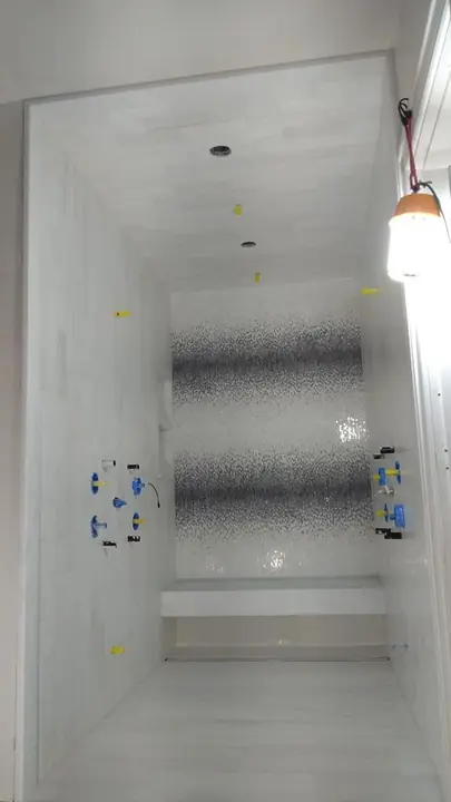 Shower niche with a mosaic accent band